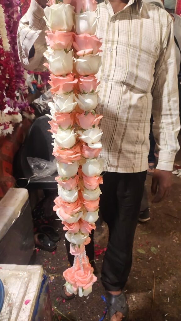 Wedding Rose petals Garland, Orchid Jaimala price, Rose Jaimala, New Style Jaimala, Orchid Flower Jaimala near me shop, Tube Roses jaimala , rajnigandha and roses Jaimala , jasmine and lilly varmala garlands price , virat kohli jaimala varmala haar, buy pink and white jaimala online price  , red and white flower varmala, blue orchid jaimala, purple orchid varmala ,  special rose petals jaimala near me