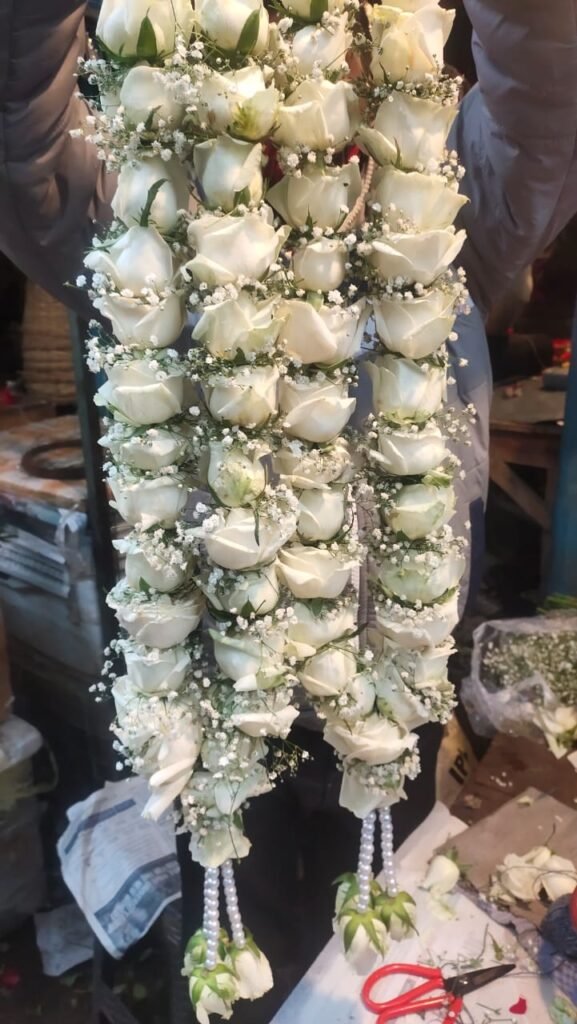 Wedding Rose petals Garland, Orchid Jaimala price, Rose Jaimala, New Style Jaimala, Orchid Flower Jaimala near me shop, Tube Roses jaimala , rajnigandha and roses Jaimala , jasmine and lilly varmala garlands price , virat kohli jaimala varmala haar, buy pink and white jaimala online price  , red and white flower varmala, blue orchid jaimala, purple orchid varmala ,  special rose petals jaimala near me