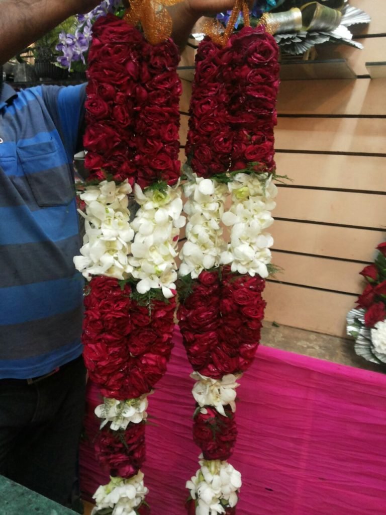 Wedding Rose petals Garland, Orchid Jaimala price, Rose Jaimala, New Style Jaimala, Orchid Flower Jaimala near me shop, Tube Roses jaimala , rajnigandha and roses Jaimala , jasmine and lilly varmala garlands price , virat kohli jaimala varmala haar, buy pink and white jaimala online price  , red and white flower varmala, blue orchid jaimala, purple orchid varmala ,  special rose petals jaimala near me