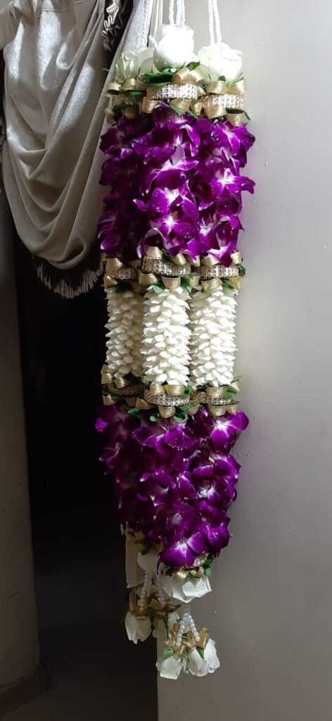 Wedding Rose petals Garland, Orchid Jaimala price, Rose Jaimala, New Style Jaimala, Orchid Flower Jaimala near me shop, Tube Roses jaimala , rajnigandha and roses Jaimala , jasmine and lilly varmala garlands price , virat kohli jaimala varmala haar, buy pink and white jaimala online price  , red and white flower varmala, blue orchid jaimala, purple orchid varmala ,  special rose petals jaimala near me