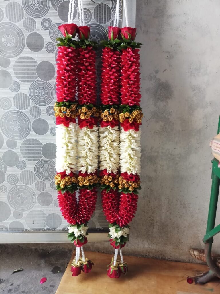 Wedding Rose petals Garland, Orchid Jaimala price, Rose Jaimala, New Style Jaimala, Orchid Flower Jaimala near me shop, Tube Roses jaimala , rajnigandha and roses Jaimala , jasmine and lilly varmala garlands price , virat kohli jaimala varmala haar, buy pink and white jaimala online price  , red and white flower varmala, blue orchid jaimala, purple orchid varmala ,  special rose petals jaimala near me