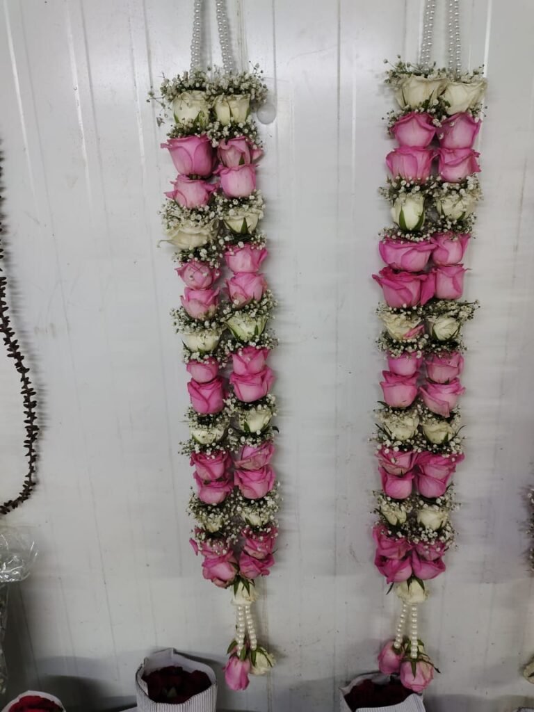 Wedding Rose petals Garland, Orchid Jaimala price, Rose Jaimala, New Style Jaimala, Orchid Flower Jaimala near me shop, Tube Roses jaimala , rajnigandha and roses Jaimala , jasmine and lilly varmala garlands price , virat kohli jaimala varmala haar, buy pink and white jaimala online price  , red and white flower varmala, blue orchid jaimala, purple orchid varmala ,  special rose petals jaimala near me