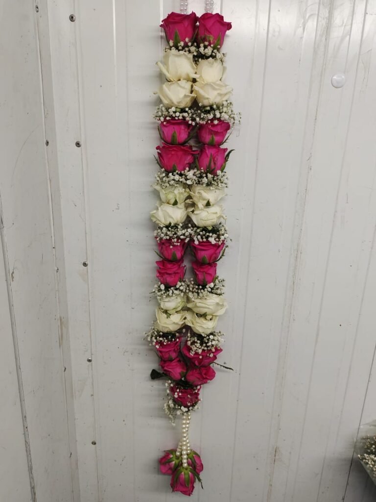 Wedding Rose petals Garland, Orchid Jaimala price, Rose Jaimala, New Style Jaimala, Orchid Flower Jaimala near me shop, Tube Roses jaimala , rajnigandha and roses Jaimala , jasmine and lilly varmala garlands price , virat kohli jaimala varmala haar, buy pink and white jaimala online price  , red and white flower varmala, blue orchid jaimala, purple orchid varmala ,  special rose petals jaimala near me