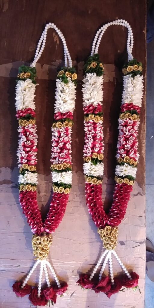 Wedding Rose petals Garland, Orchid Jaimala price, Rose Jaimala, New Style Jaimala, Orchid Flower Jaimala near me shop, Tube Roses jaimala , rajnigandha and roses Jaimala , jasmine and lilly varmala garlands price , virat kohli jaimala varmala haar, buy pink and white jaimala online price  , red and white flower varmala, blue orchid jaimala, purple orchid varmala ,  special rose petals jaimala near me