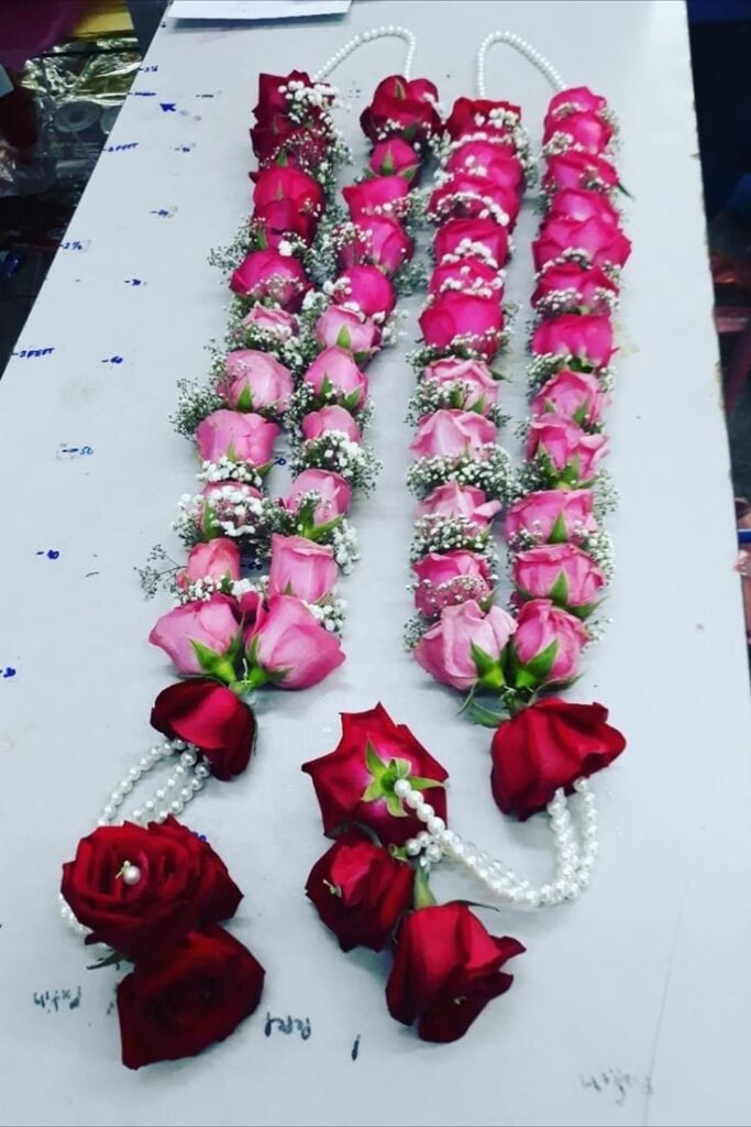 Wedding Rose petals Garland, Orchid Jaimala price, Rose Jaimala, New Style Jaimala, Orchid Flower Jaimala near me shop, Tube Roses jaimala , rajnigandha and roses Jaimala , jasmine and lilly varmala garlands price , virat kohli jaimala varmala haar, buy pink and white jaimala online price  , red and white flower varmala, blue orchid jaimala, purple orchid varmala ,  special rose petals jaimala near me