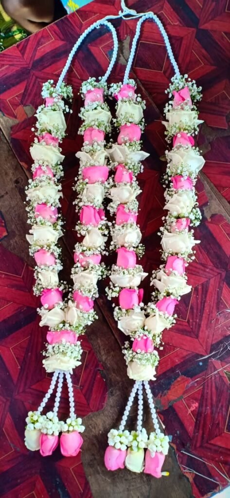 Wedding Rose petals Garland, Orchid Jaimala price, Rose Jaimala, New Style Jaimala, Orchid Flower Jaimala near me shop, Tube Roses jaimala , rajnigandha and roses Jaimala , jasmine and lilly varmala garlands price , virat kohli jaimala varmala haar, buy pink and white jaimala online price  , red and white flower varmala, blue orchid jaimala, purple orchid varmala ,  special rose petals jaimala near me