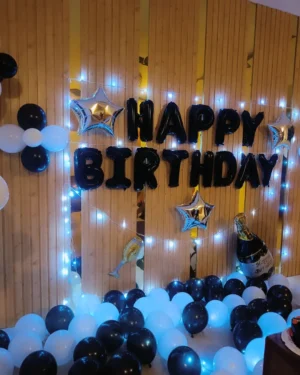 birthday decoration with black and white balloons 2